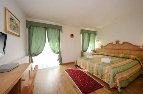 Imagen de la habitación del Hotel Garden, Moena - Alpe Lusia. Foto 9