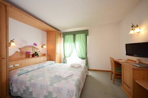 Imagen de la habitación del Hotel Garden, Moena - Alpe Lusia. Foto 10