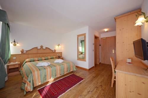 Imagen de la habitación del Hotel Garden, Moena - Alpe Lusia. Foto 11