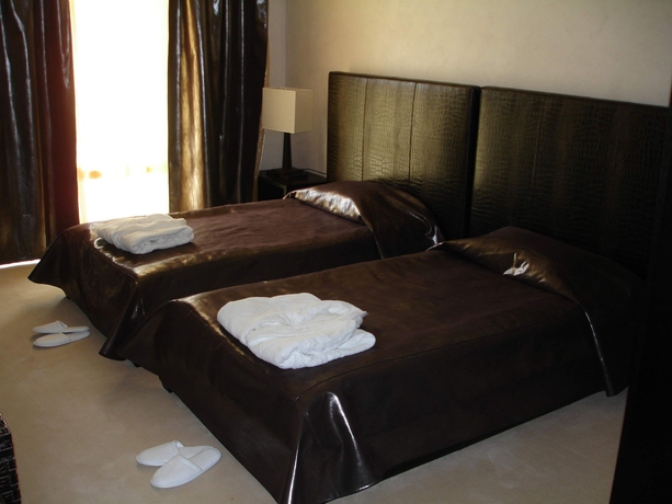 Imagen de la habitación del Hotel Garden Of Eden Complex. Foto 6