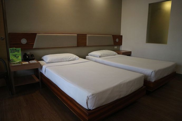 Imagen de la habitación del Hotel Garden Orchid. Foto 9