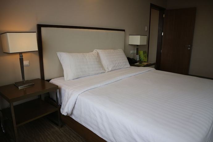 Imagen de la habitación del Hotel Garden Orchid Hotel. Foto 13