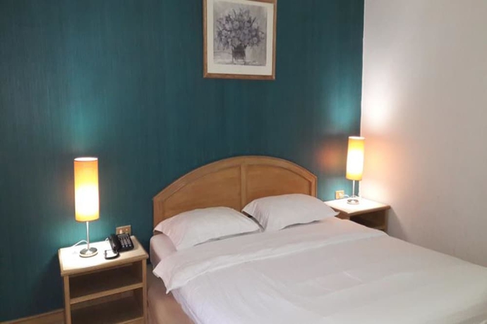 Imagen de la habitación del Hotel Garden Paradise and Serviced Apartment. Foto 4