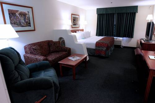 Imagen de la habitación del Hotel Garden Place Suites. Foto 3