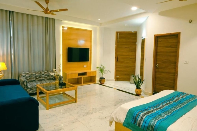 Imagen de la habitación del Hotel Garden Resorts and. Foto 7