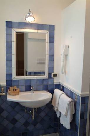 Imagen de la habitación del Hotel Garden Riviera. Foto 5