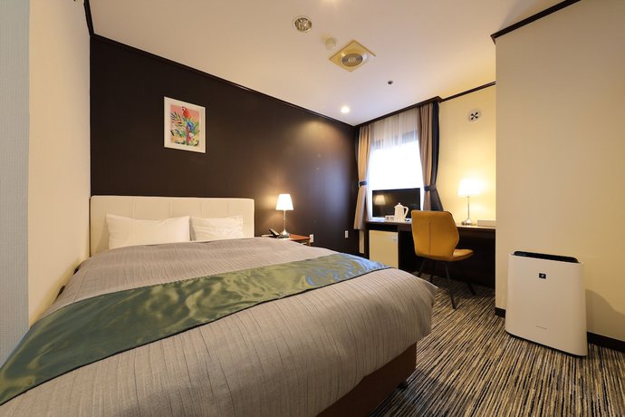 Imagen de la habitación del Hotel Garden Shiunkaku Higashimastuyama. Foto 11