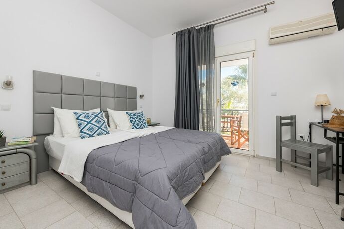 Imagen de la habitación del Hotel Garden Studios. Foto 19