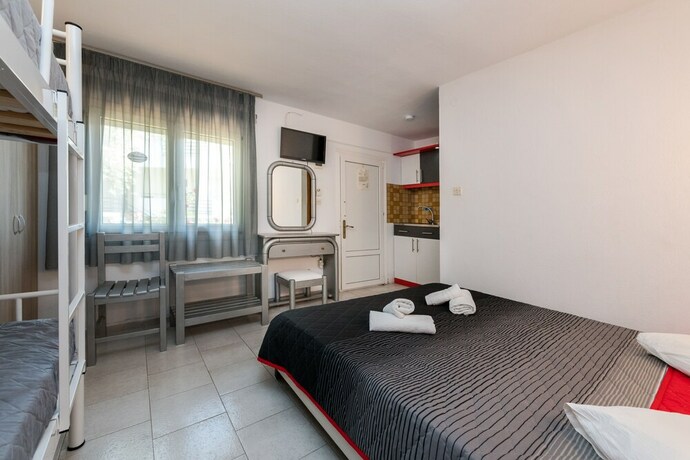 Imagen de la habitación del Hotel Garden Studios. Foto 20