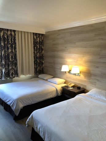 Imagen de la habitación del Hotel Garden Suite. Foto 11