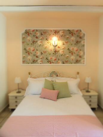 Imagen de la habitación del Hotel Garden Village. Foto 14