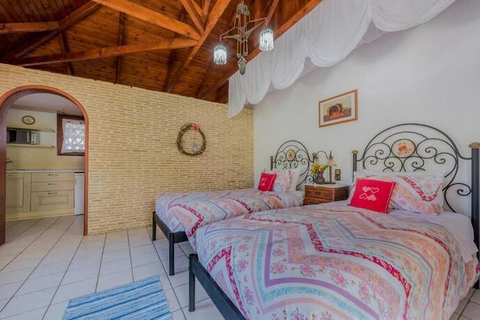 Imagen de la habitación del Hotel Garden Village. Foto 15