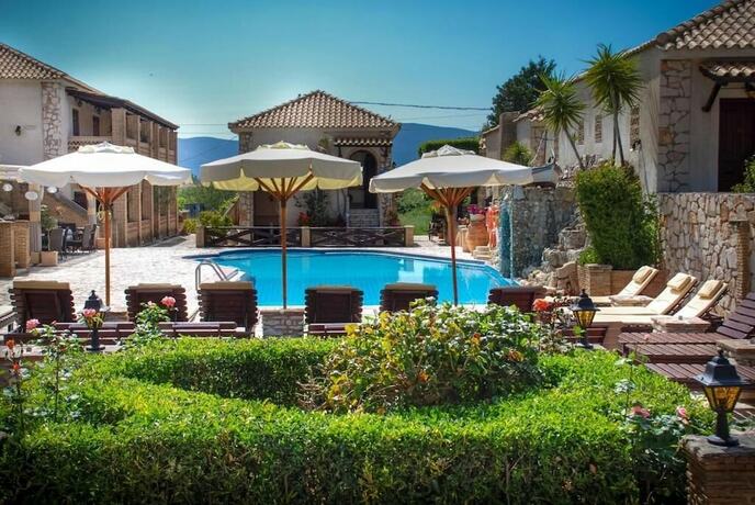 Imagen de la habitación del Hotel Garden Village. Foto 16