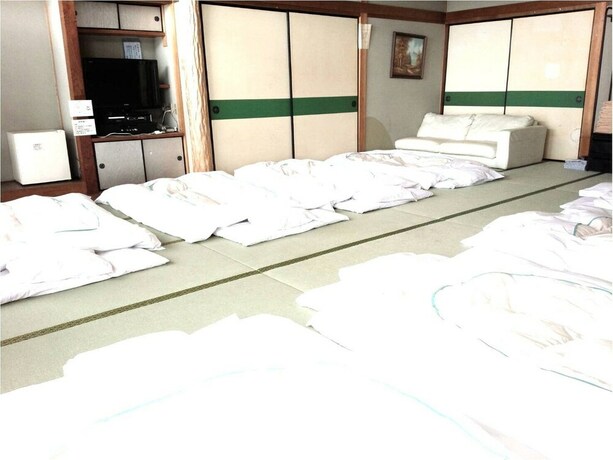 Imagen de la habitación del Hotel Garden Yamato. Foto 17