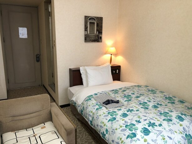 Imagen de la habitación del Hotel Garden Yamato. Foto 20