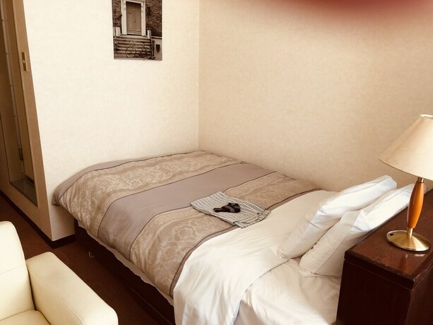 Imagen de la habitación del Hotel Garden Yamato. Foto 21