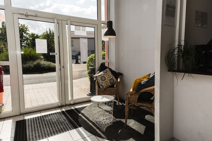 Imagen de los interiores del Hotel Garden and City Clermont Ferrand Gerzat. Foto 18