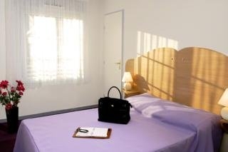 Imagen de la habitación del Hotel Garden and City Lyon Lissieu. Foto 5