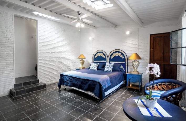 Imagen de la habitación del Hotel Garden of Dreams Boutique. Foto 7