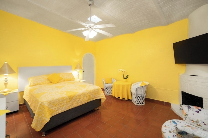 Imagen de la habitación del Hotel Garden of Dreams Boutique. Foto 12