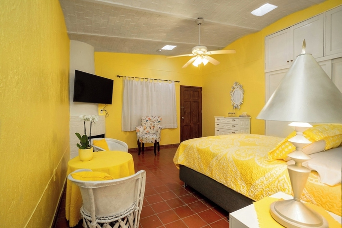 Imagen de la habitación del Hotel Garden of Dreams Boutique. Foto 13