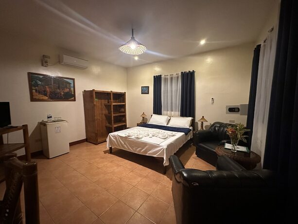 Imagen de la habitación del Hotel Garden of Eden Dive Resort. Foto 16