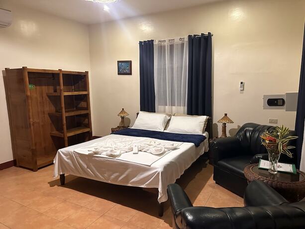 Imagen de la habitación del Hotel Garden of Eden Dive Resort. Foto 17