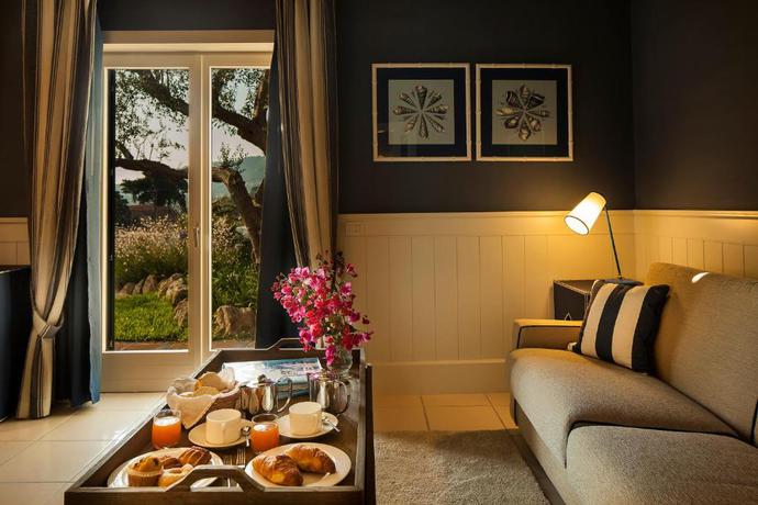 Imagen de la habitación del Hotel Garden y Villas Resort. Foto 4