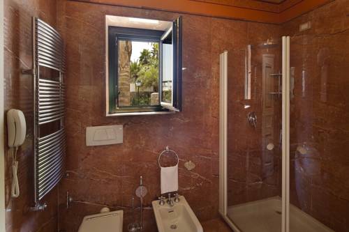Imagen de la habitación del Hotel Garden y Villas Resort. Foto 6