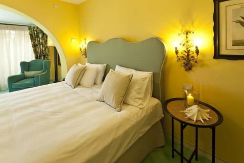 Imagen de la habitación del Hotel Garden y Villas Resort. Foto 8