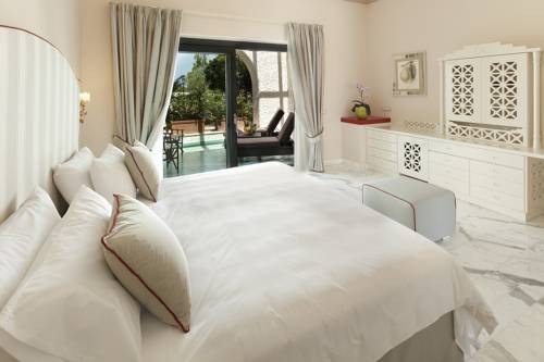 Imagen de la habitación del Hotel Garden y Villas Resort. Foto 12