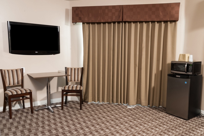 Imagen de la habitación del Hotel Gardena Terrace Inn. Foto 9