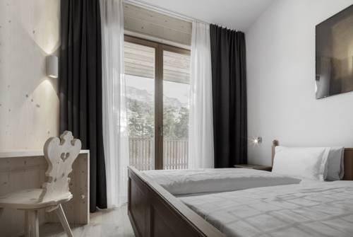Imagen de la habitación del Hotel Gardenazza. Foto 9