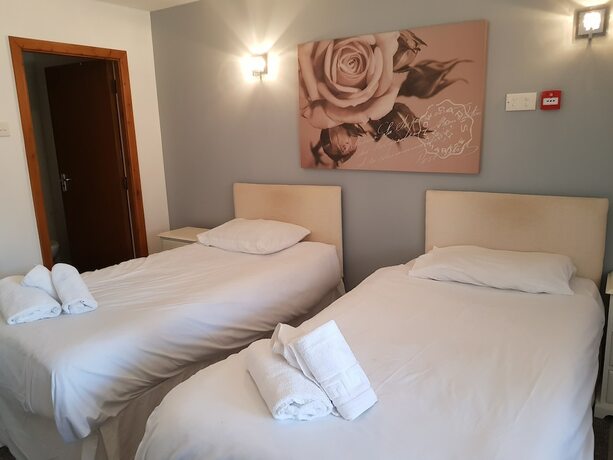 Imagen de la habitación del Hotel Gardeners Country Inn. Foto 16