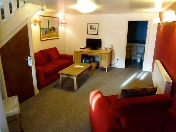 Imagen de la habitación del Hotel Gardeners Country Inn. Foto 19