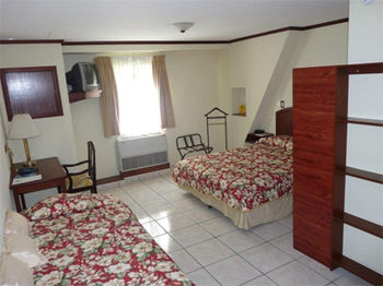 Imagen de la habitación del Hotel Gardenia Inn. Foto 2