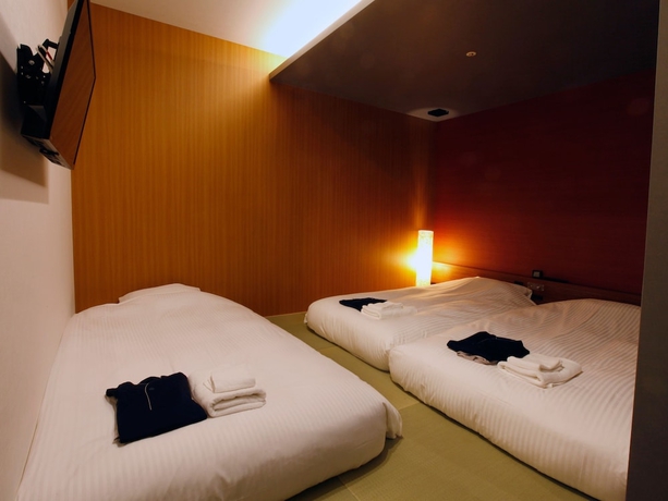 Imagen de la habitación del Hotel Gardens Cabin. Foto 10