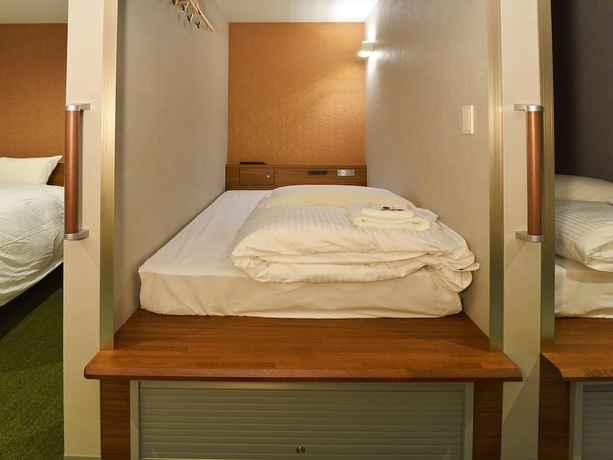 Imagen de la habitación del Hotel Gardens Cabin. Foto 12