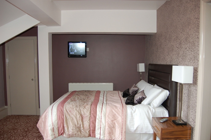 Imagen de la habitación del Hotel Gardens. Foto 5