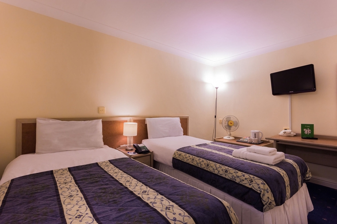 Imagen de la habitación del Hotel Gardens. Foto 7