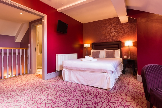 Imagen de la habitación del Hotel Gardens. Foto 13