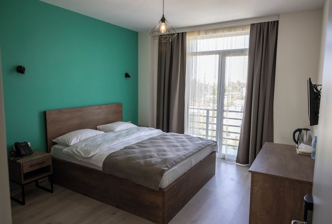 Imagen de la habitación del Hotel Gardenville Batumi. Foto 8