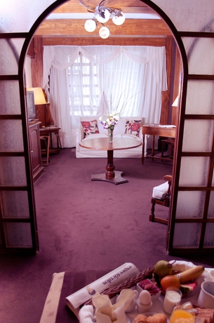 Imagen de la habitación del Hotel Gardi & Suites. Foto 7