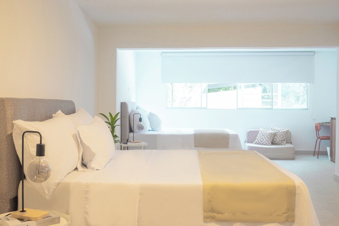 Imagen de la habitación del Hotel Gardin home. Foto 2