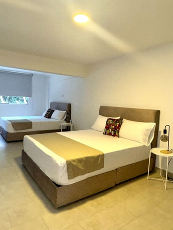 Imagen de la habitación del Hotel Gardin home. Foto 10