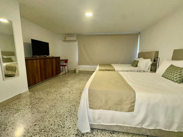 Imagen de la habitación del Hotel Gardin home. Foto 15
