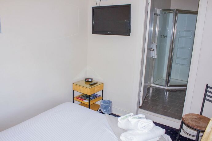 Imagen de la habitación del Hotel Gardners Inn. Foto 17