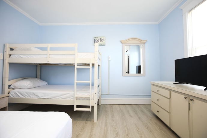 Imagen de la habitación del Hotel Garfield Beach House. Foto 13