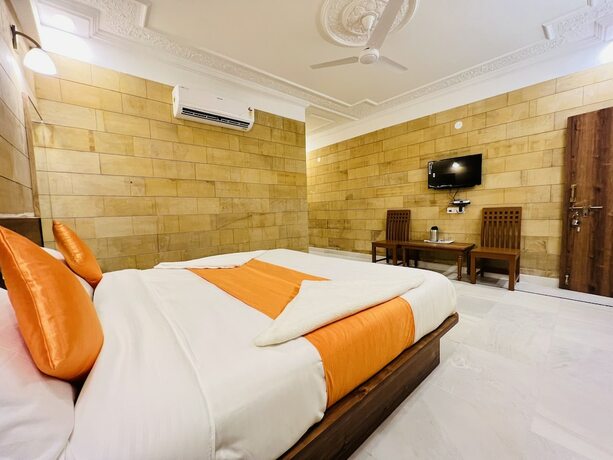 Imagen de la habitación del Hotel Garh Villa. Foto 11