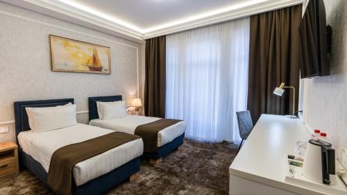 Imagen de la habitación del Hotel Garnet Mir. Foto 14